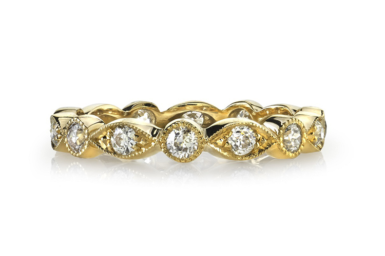 Single Stone at Greenwich St. Jewelers Alternating marquise- and round bezel-set .68 TCW, 18K gold