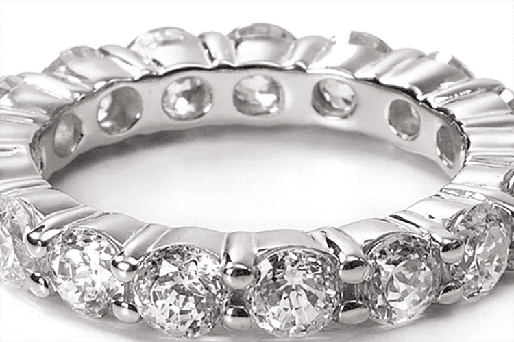 Crislu sterling silver round stone eternity band ring. (Photo by Bloomingdales)..webp