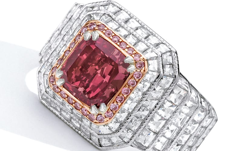 Fancy red diamond and diamond ring, centering a cushion-cut fancy red diamond weighing 1.38 carats, framed by round diamonds of pink hue, further decorated by square-cut diamonds. Fancy red, natural color, SI2 clarity. Estimated to be $1.8 million to $2.8 million. (Photo Courtesy of Sotheby’s)