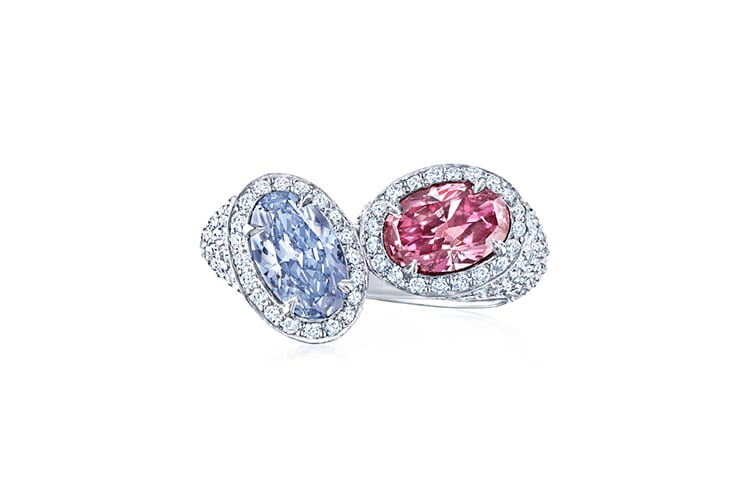 Kwiat oval blue and pink diamond bypass ring with pavé diamond halo in rose gold and platinum. Price upon request. (Photo courtesy of Kwiat)