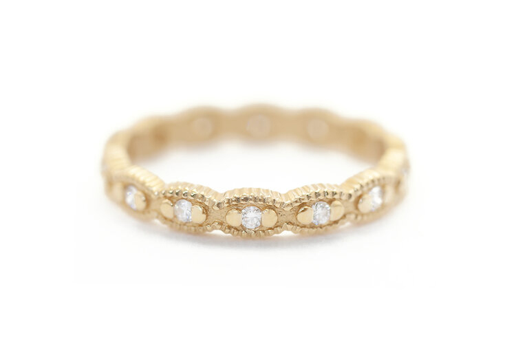 Megan Thorne marquise-shaped 18k setting with prong-set round diamonds]