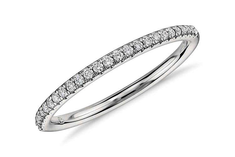 Petite micro pave diamond engagement ring. Photo by Blue Nile.