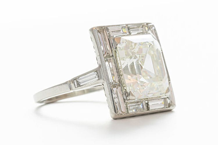 Gray & Davis Art Deco 5.35-carat emerald cut diamond-framed by a surround of channel set baguettes.