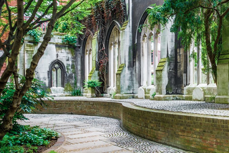 View of gardens surrounding church ruins