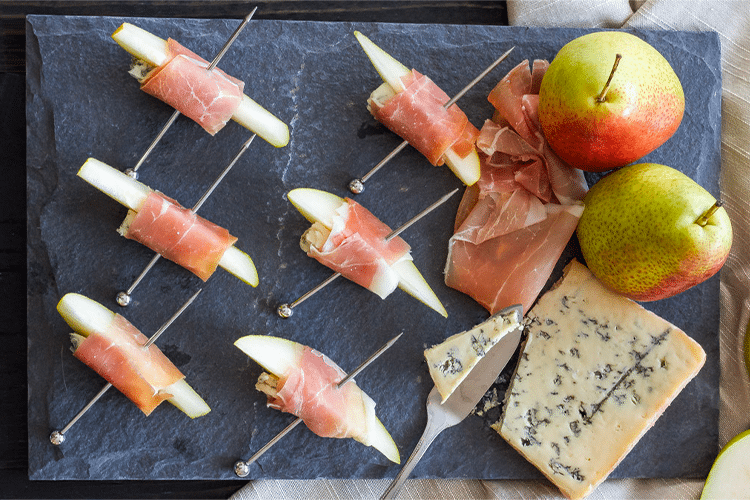 Pear slices with blue cheese on skewers