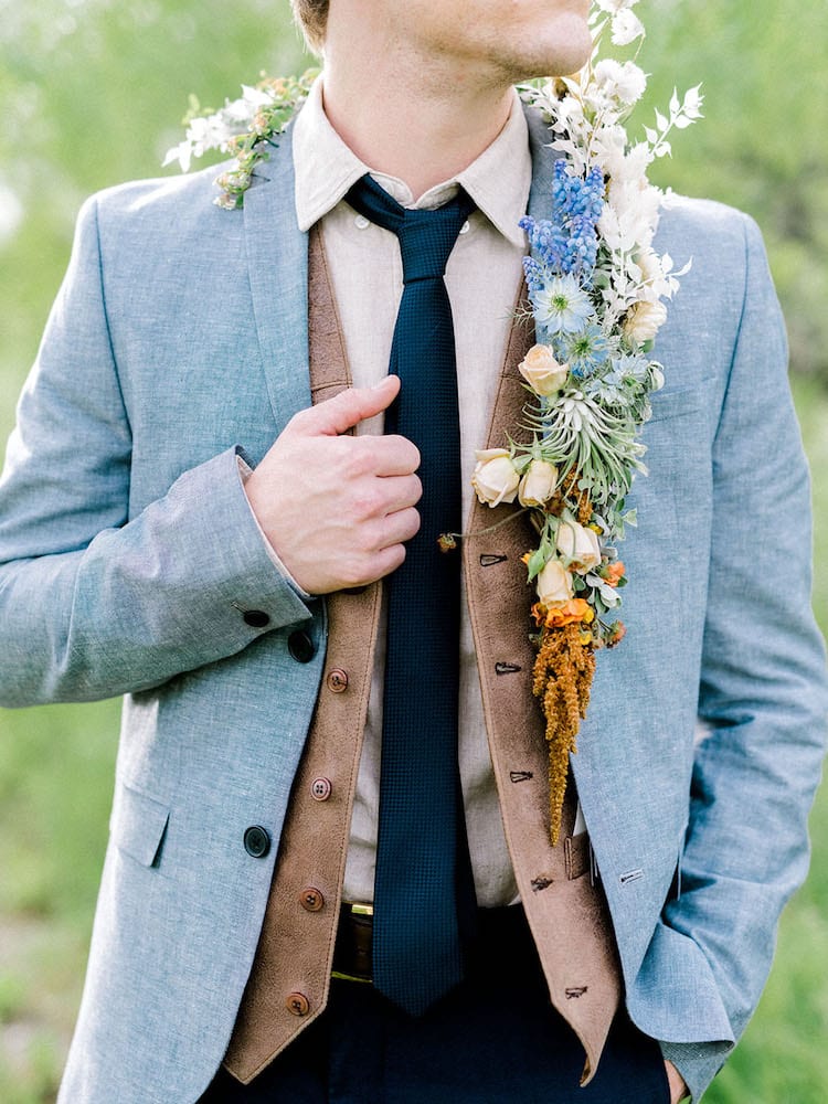 The modern gentleman style in blue suit groom