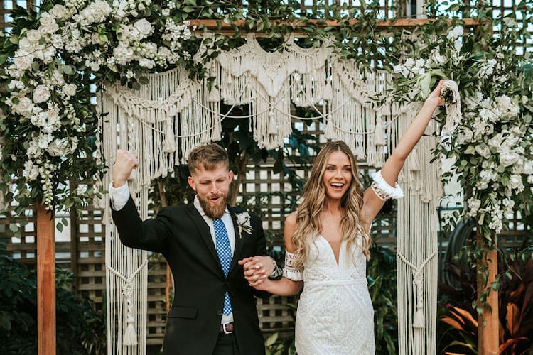 wedding day black suit look couple