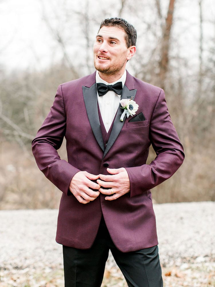 The modern gentleman style in oxblood separates groom